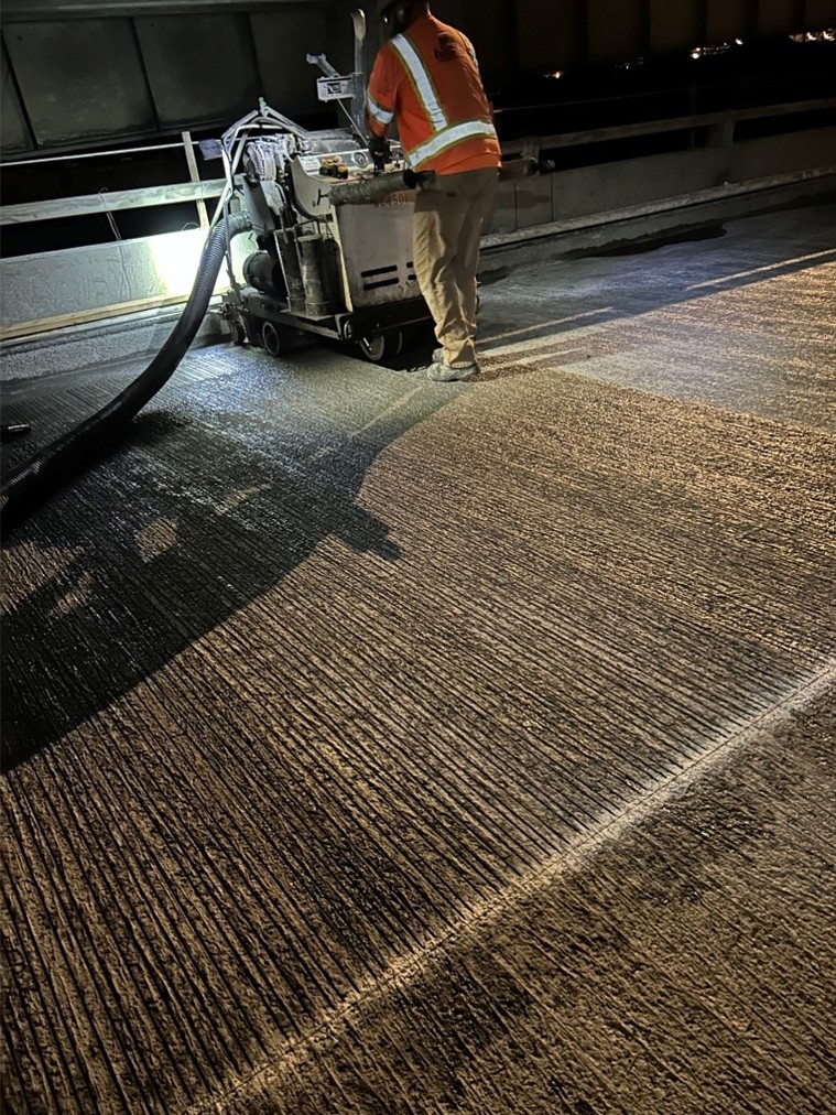 Crews saw-cutting texture into the concrete on Sept. 29, which improves traction and water drainage.